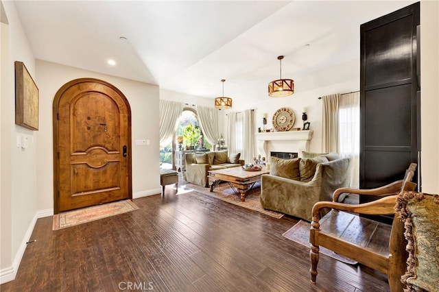 entryway with dark wood-type flooring