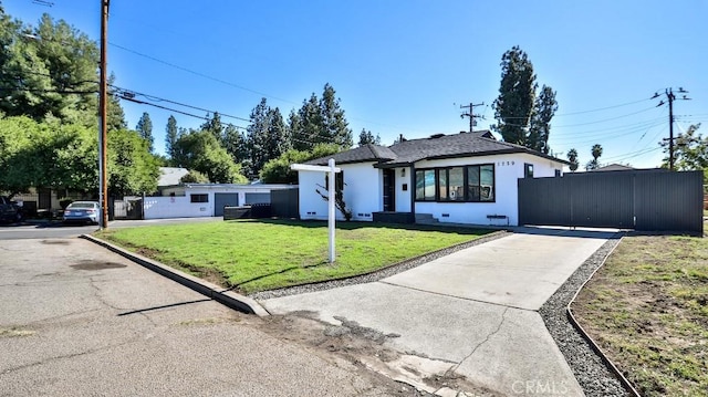 view of front of home with a front yard