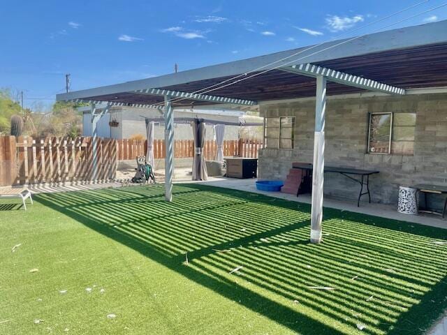 view of yard featuring a pergola and a patio area