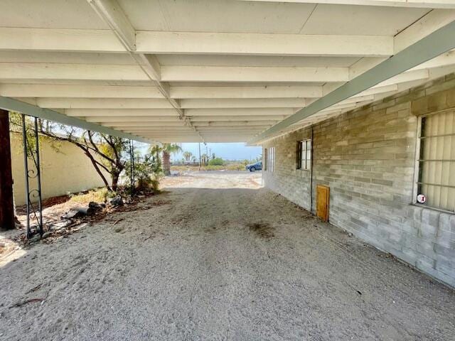 interior space featuring a carport