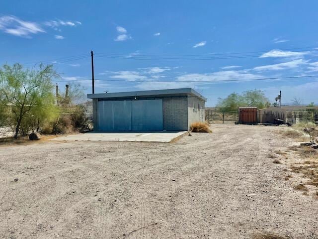 view of outbuilding featuring a garage