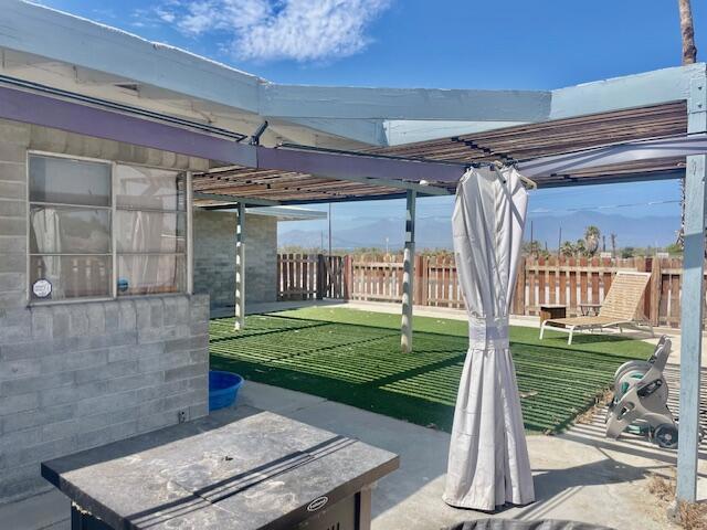 view of patio / terrace featuring a pergola