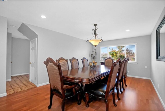 dining area featuring wood-type flooring