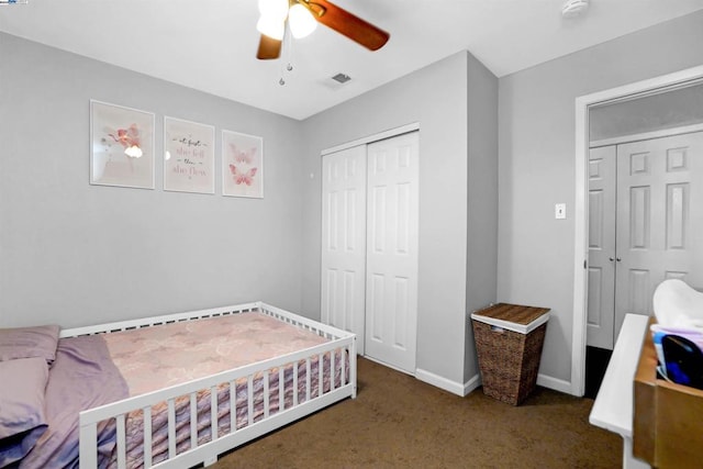 carpeted bedroom with a closet and ceiling fan