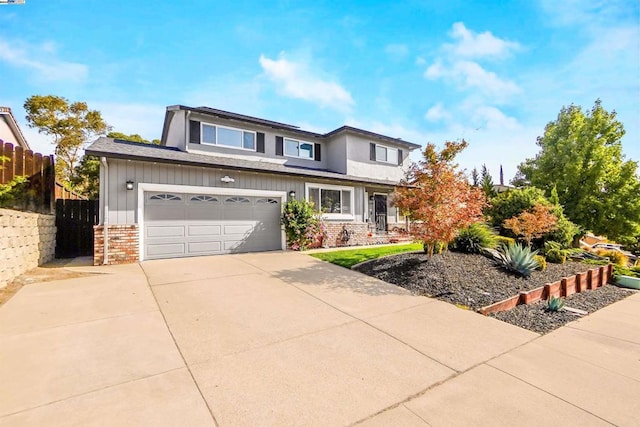 view of front of property featuring a garage