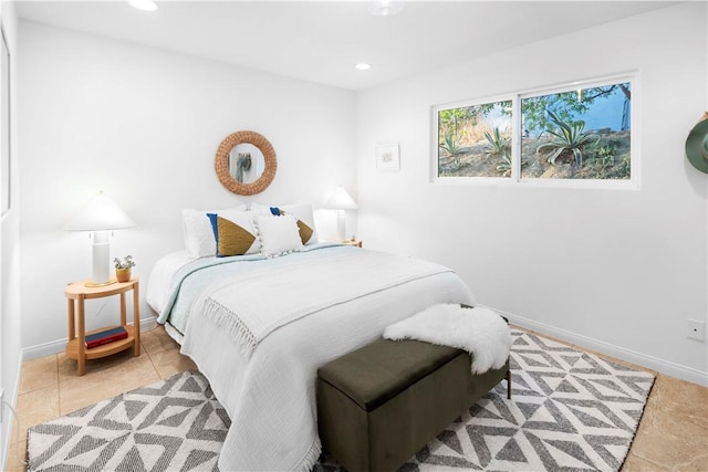 bedroom featuring light tile patterned floors