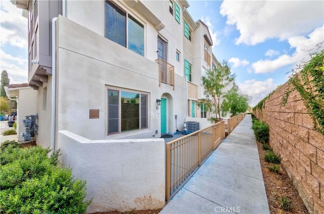 view of home's exterior featuring central AC unit