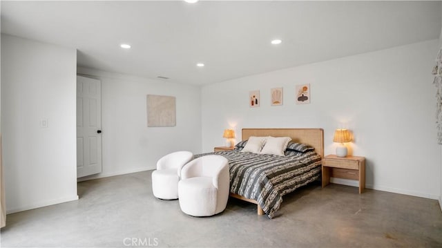 bedroom with concrete floors