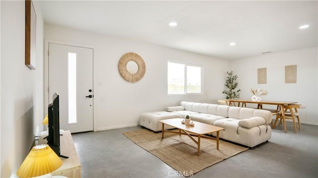 living room with concrete floors