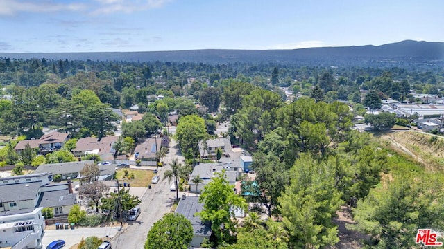 drone / aerial view featuring a mountain view