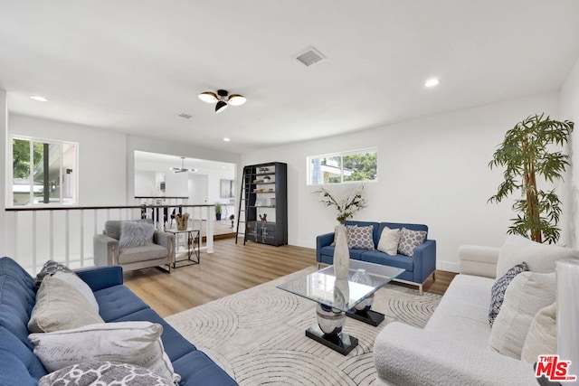 living room with light hardwood / wood-style floors