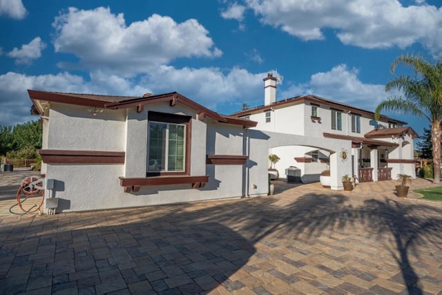 view of front of home with a patio