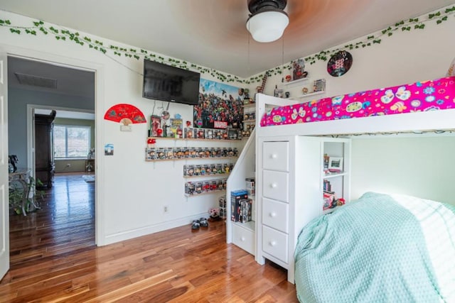 bedroom featuring hardwood / wood-style floors