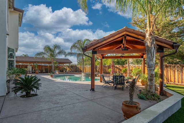 view of pool with a gazebo and a patio