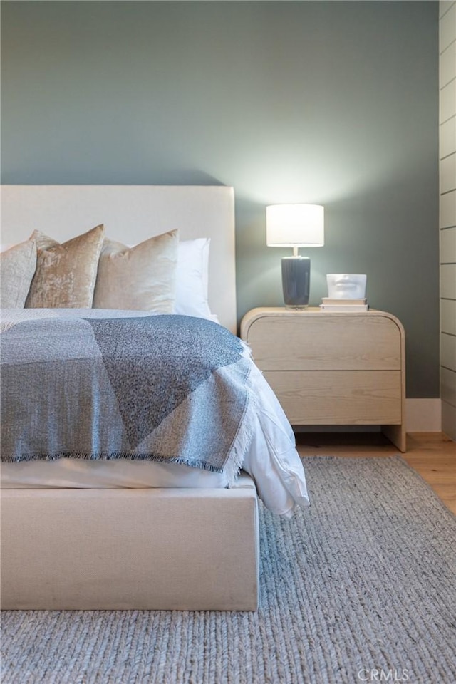 bedroom featuring light wood-type flooring