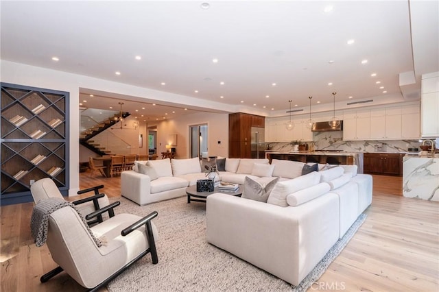 living room with light hardwood / wood-style floors