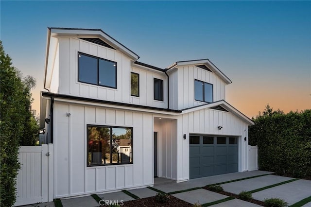 modern inspired farmhouse featuring a garage