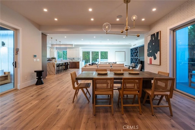 dining room featuring ceiling fan and hardwood / wood-style flooring