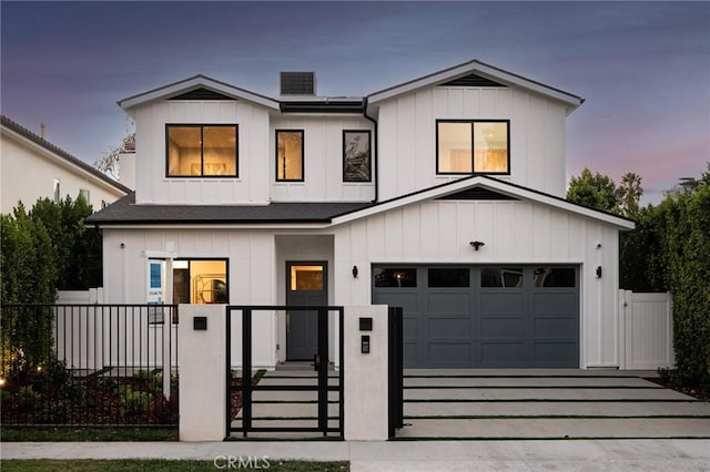 modern inspired farmhouse featuring a garage