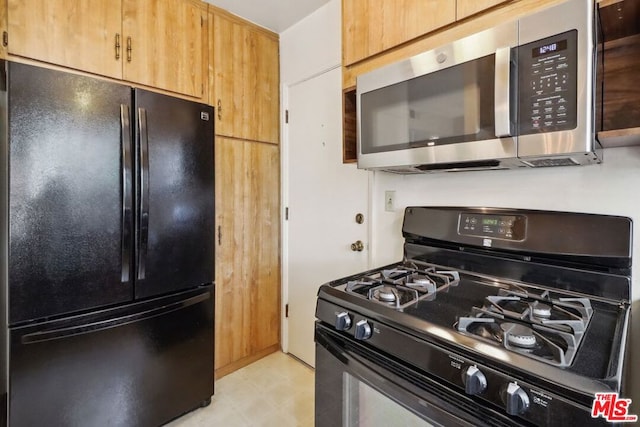 kitchen featuring black appliances