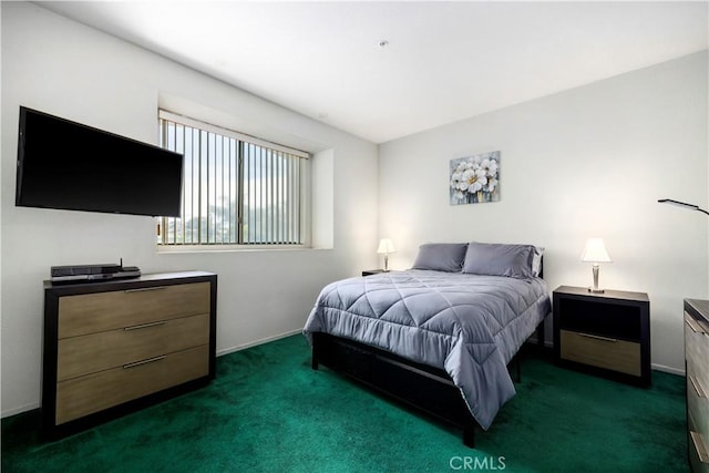 bedroom featuring dark colored carpet