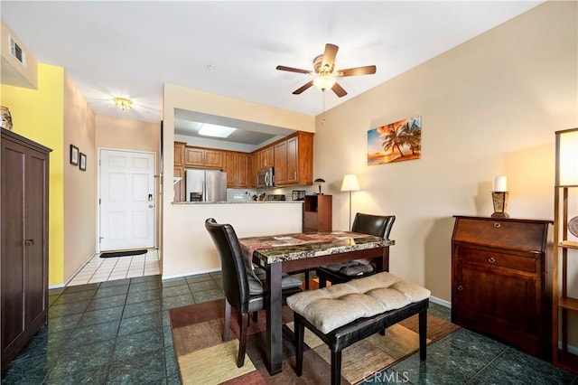 dining room with ceiling fan