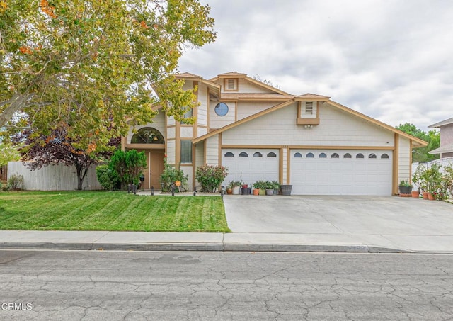 view of front of home featuring a garage and a front lawn