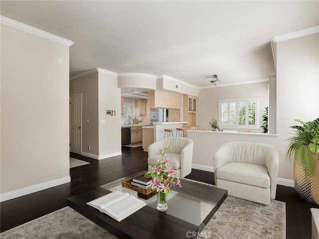 living room with dark hardwood / wood-style floors and crown molding