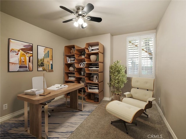 office featuring carpet flooring and ceiling fan