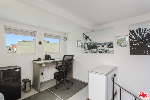 office with beam ceiling and a wealth of natural light