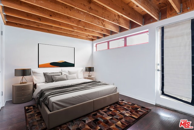 bedroom featuring dark hardwood / wood-style floors