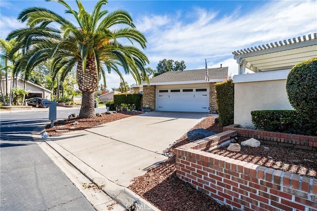 view of side of home featuring a garage