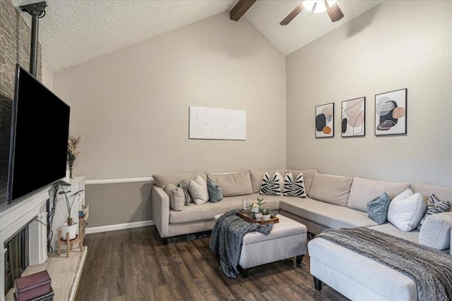 living room featuring a textured ceiling, vaulted ceiling with beams, hardwood / wood-style flooring, and ceiling fan