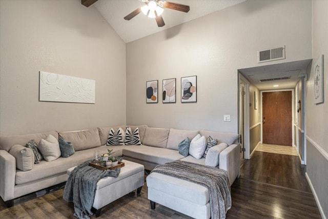 living room with ceiling fan, dark hardwood / wood-style flooring, and high vaulted ceiling