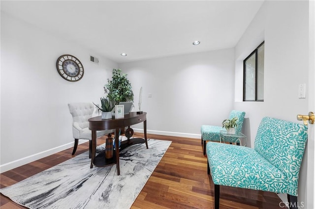 home office with hardwood / wood-style flooring