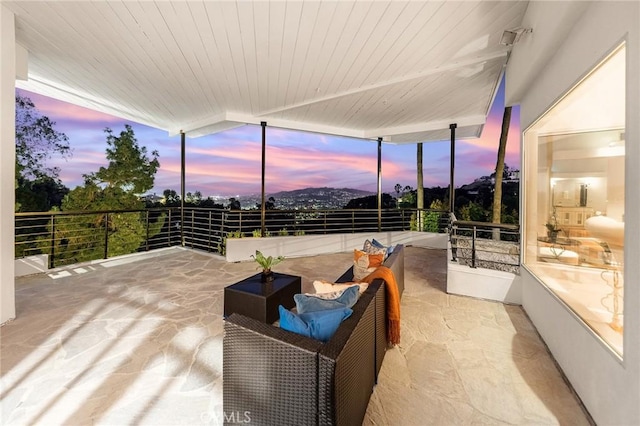 sunroom with wooden ceiling