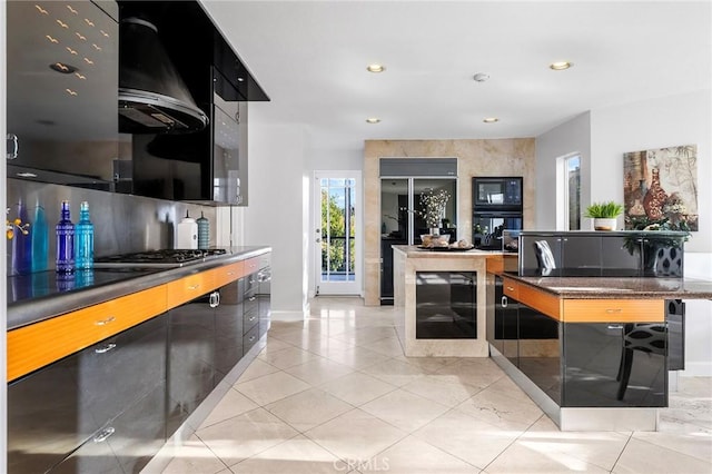 kitchen with backsplash, wine cooler, and black appliances