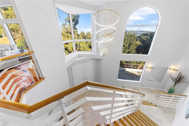 stairs featuring tile patterned flooring