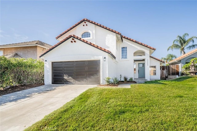 mediterranean / spanish-style house with a front yard and a garage