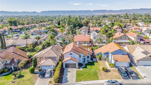 bird's eye view with a mountain view