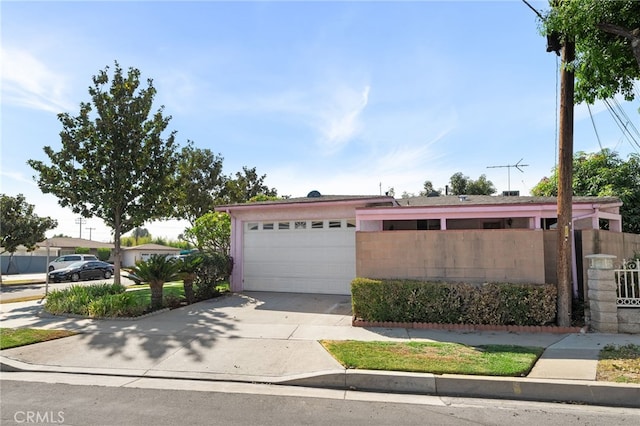 view of front of home featuring a garage