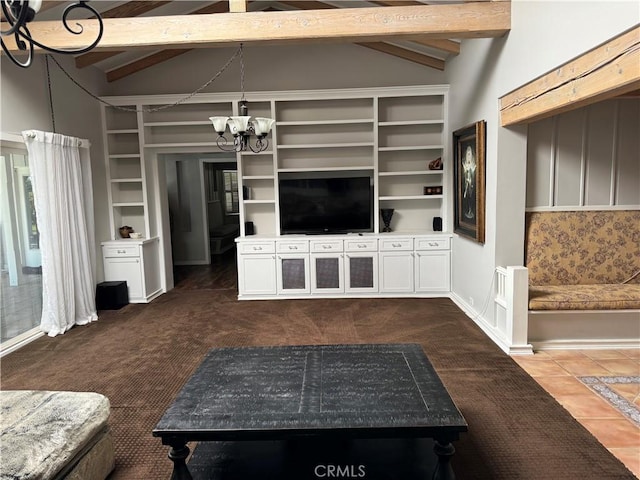 carpeted living room featuring a chandelier and lofted ceiling with beams