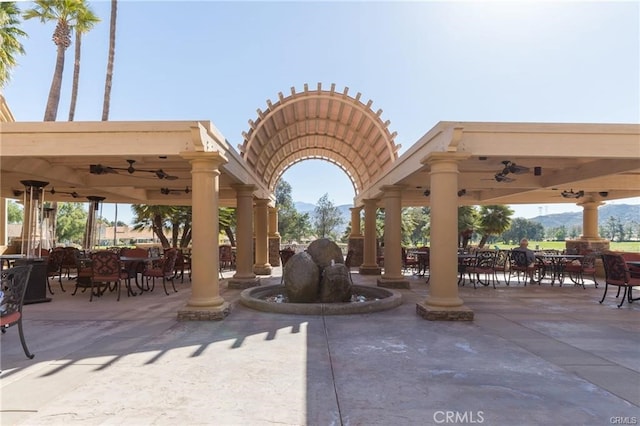 view of home's community with a gazebo and a patio