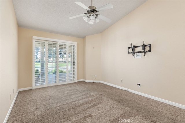 unfurnished room with a textured ceiling, ceiling fan, and carpet flooring