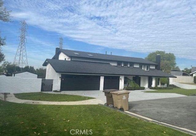 view of property featuring a front yard