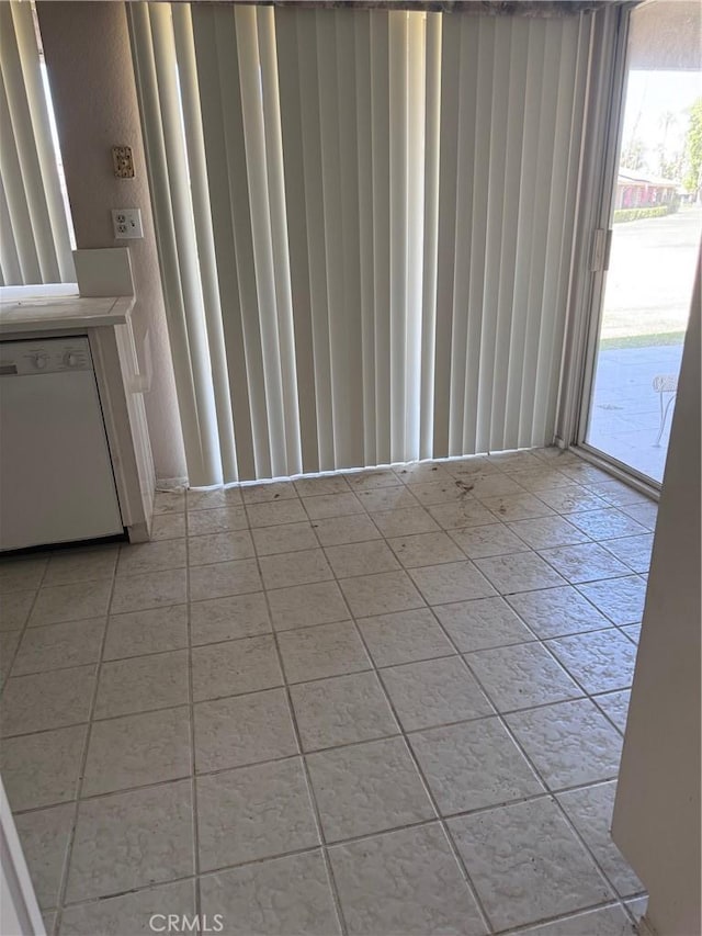 view of tiled spare room