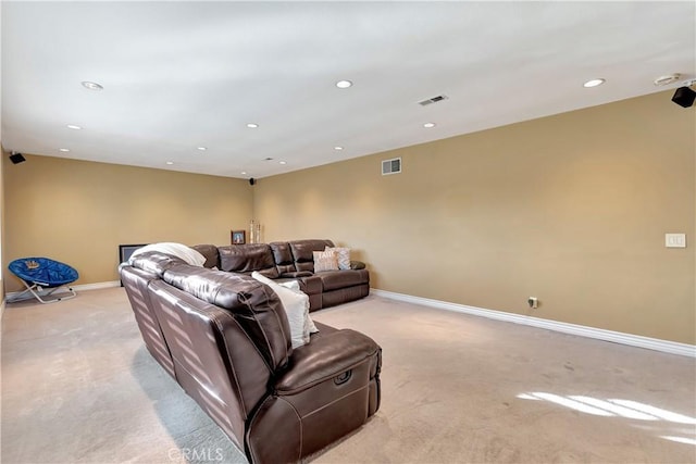 cinema room with light colored carpet