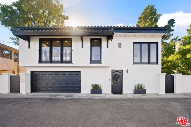 view of front of property featuring a garage