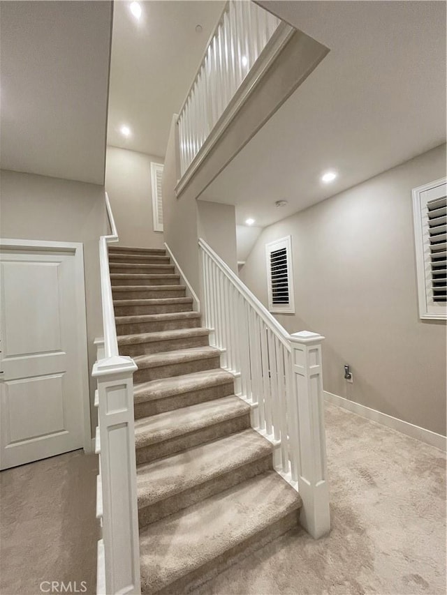 stairway with carpet flooring