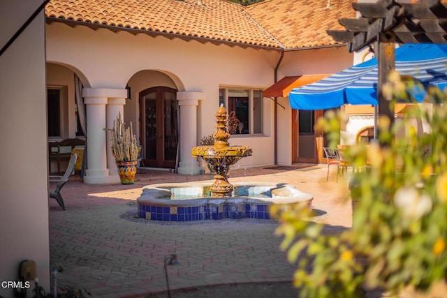 view of patio / terrace featuring french doors